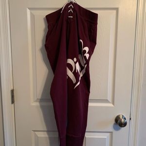 Pink joggers. Purple and white in color. Size small.  Normal wear.